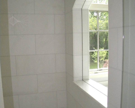 Master shower with tassos marble tiles